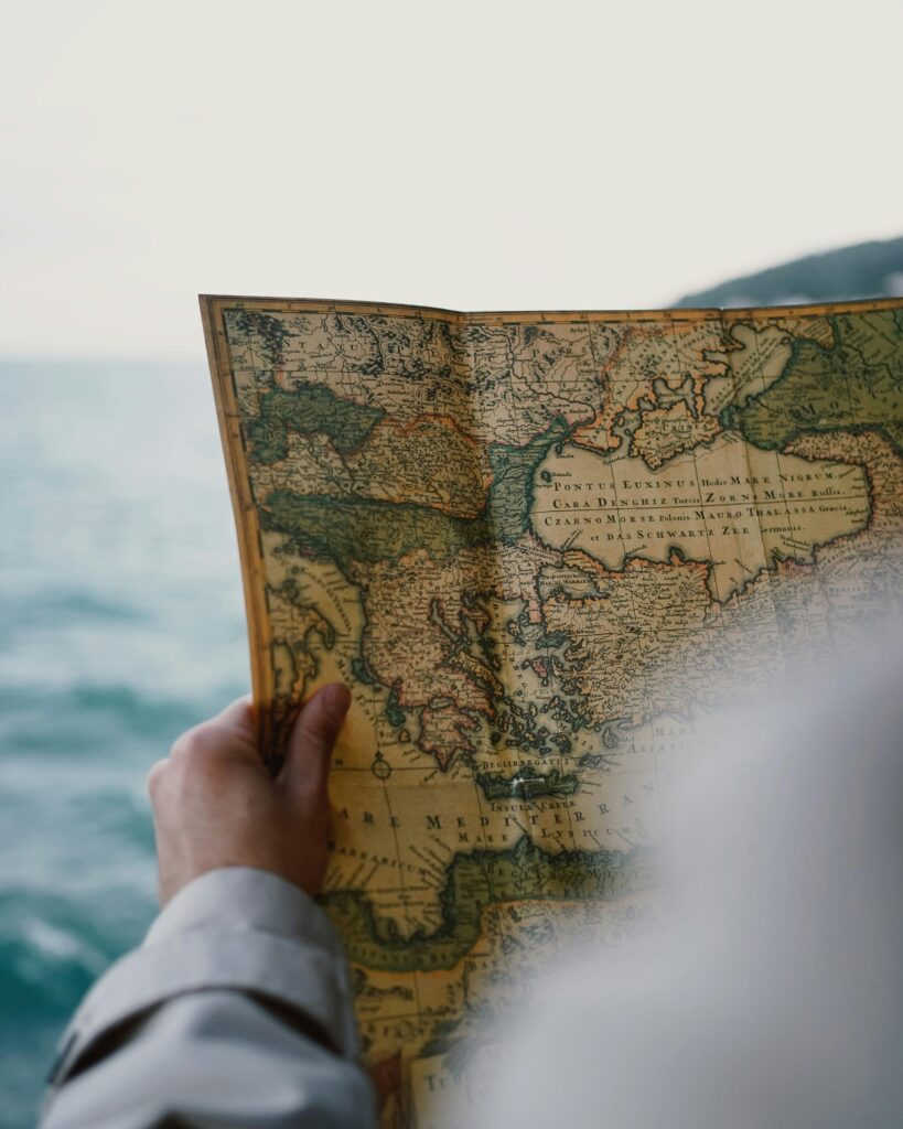 Man Hand Holding Vintage Map of Turkey